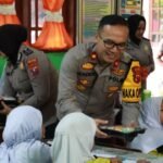 Polres Asahan Laksanan Pemberian Makan Gratis SD Negeri 010089 Sedang Sari Kisaran