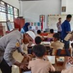 Dukung Program Presiden Prabowo, Kapolres Palopo Bagikan Makanan Bergizi Gratis di SDN 35 Lamandu